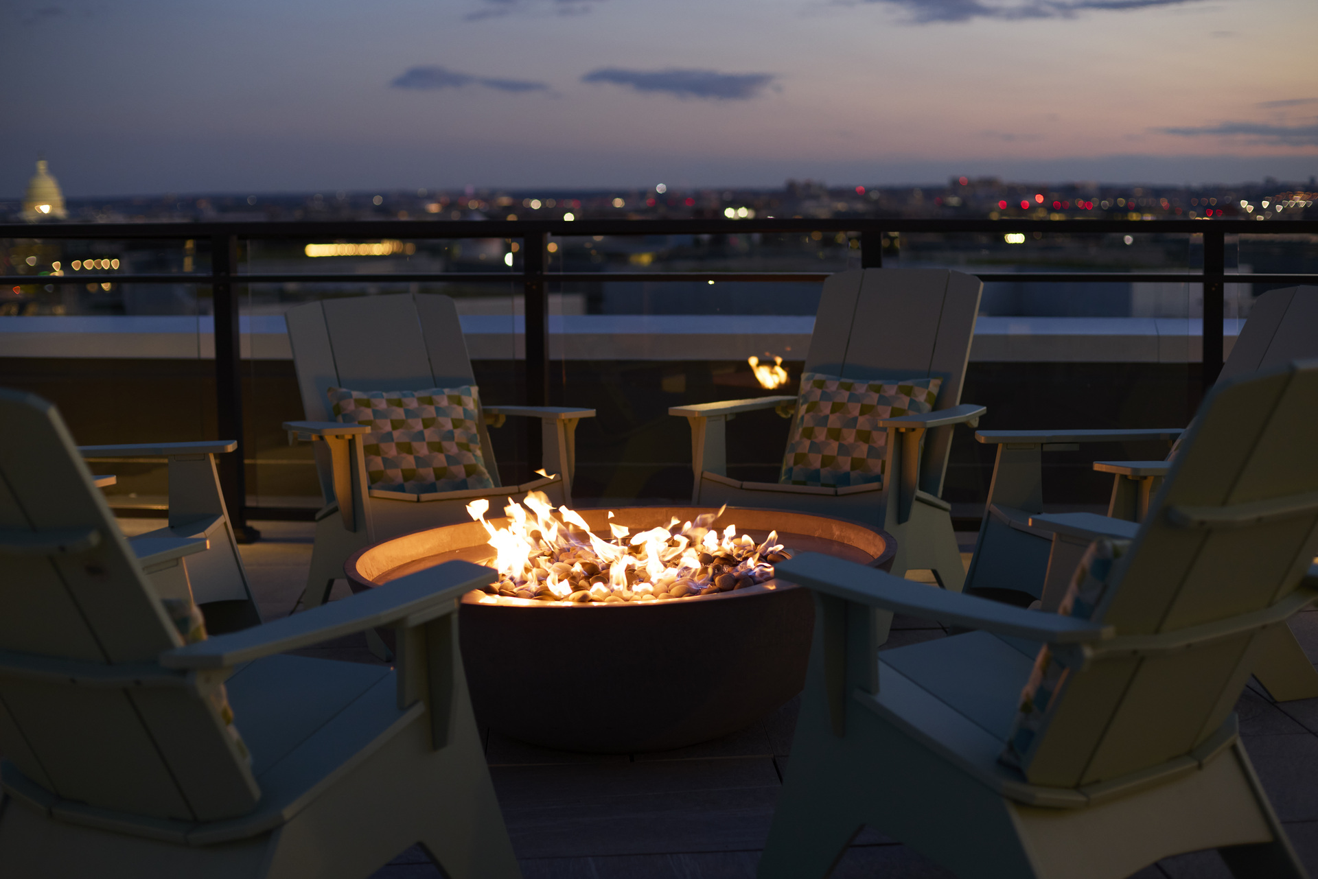 Firepit area at The 202 in DC, featuring cozy seating and a warm atmosphere for outdoor gatherings.