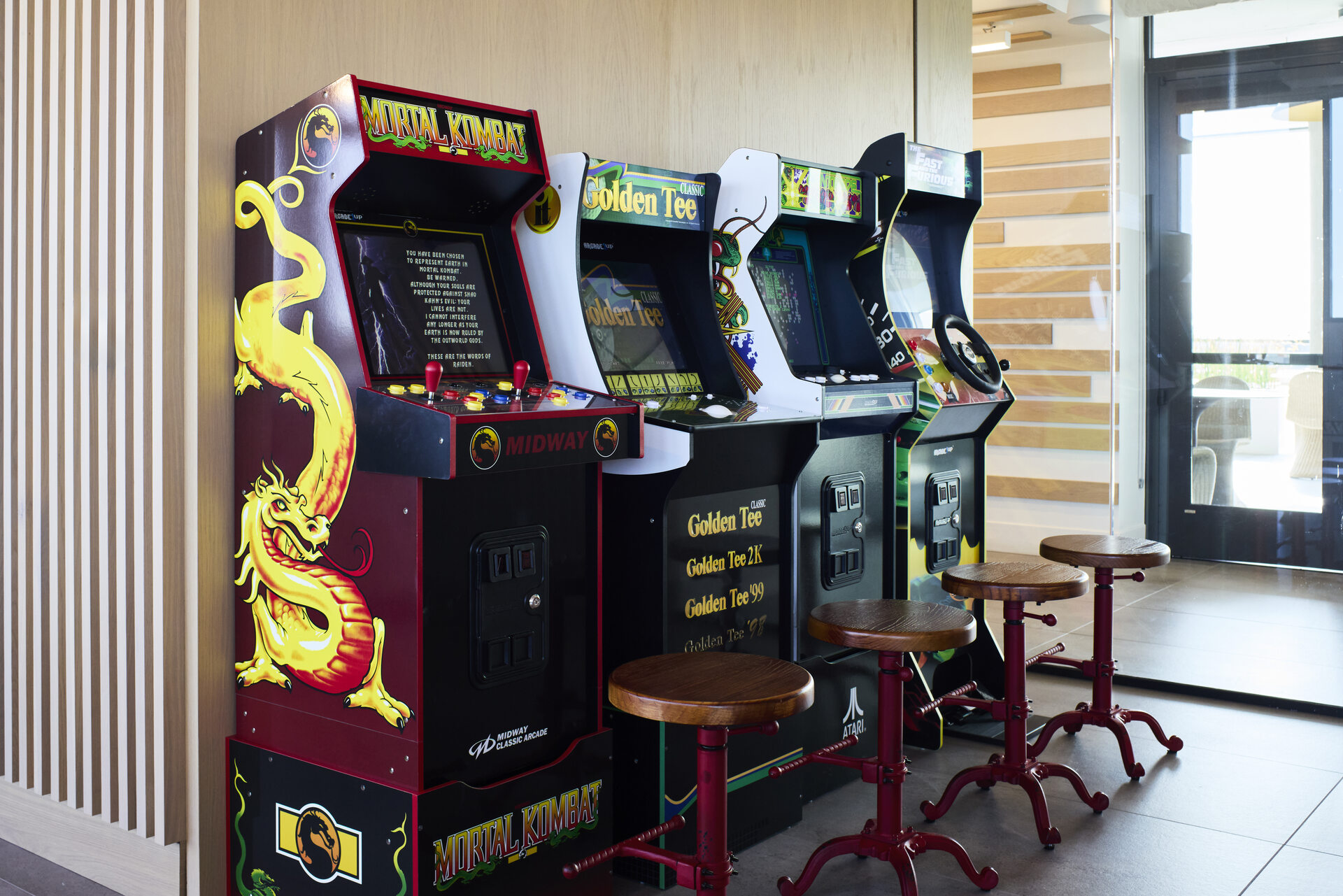 Arcade game area at The 202 in DC, featuring colorful arcade machines and a fun, vibrant atmosphere.