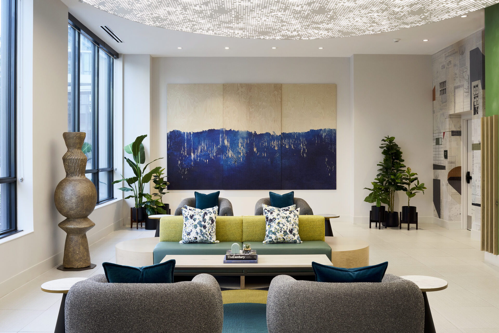 Lobby lounge at The 202 in DC, featuring elegant seating arrangements and stylish decor, creating a welcoming atmosphere.