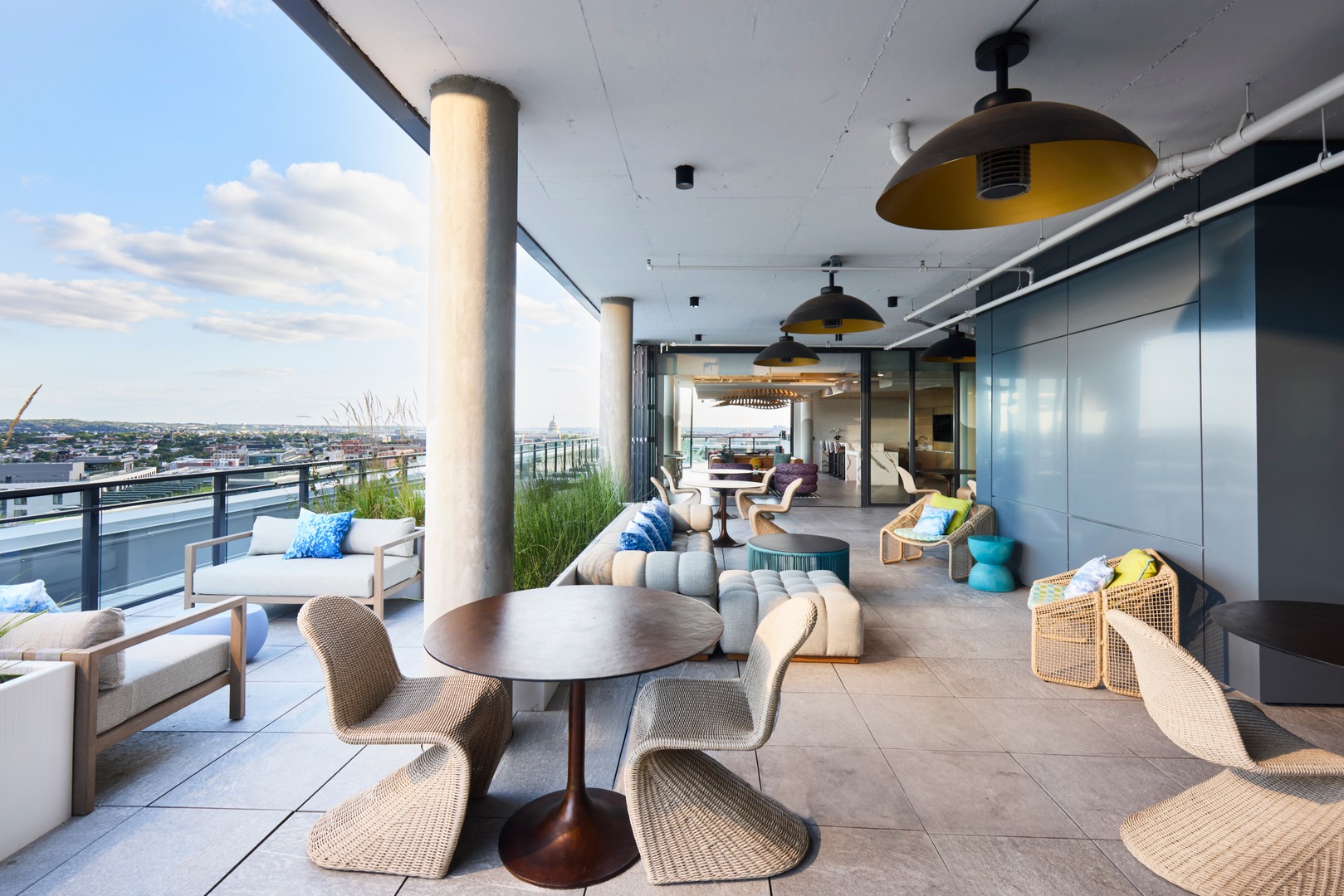 Outdoor lounge space with seating and a view